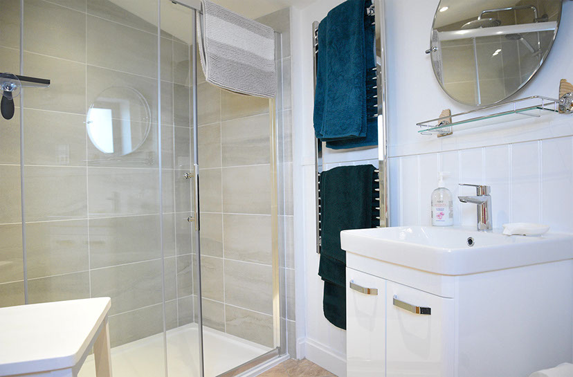 Our Self Catering accommodation contains an en suite bathroom with walk in shower sink and toilet